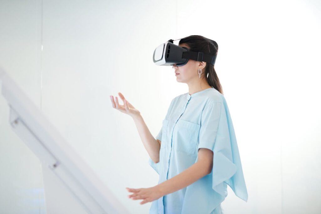 Young woman engaged in virtual reality experience with a headset indoors.